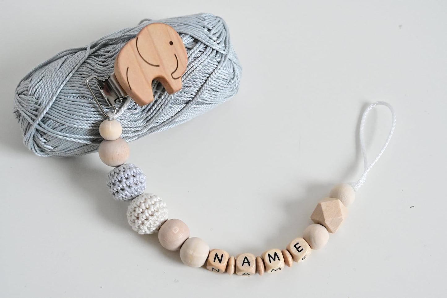 Elephant and a personalized dummy chain